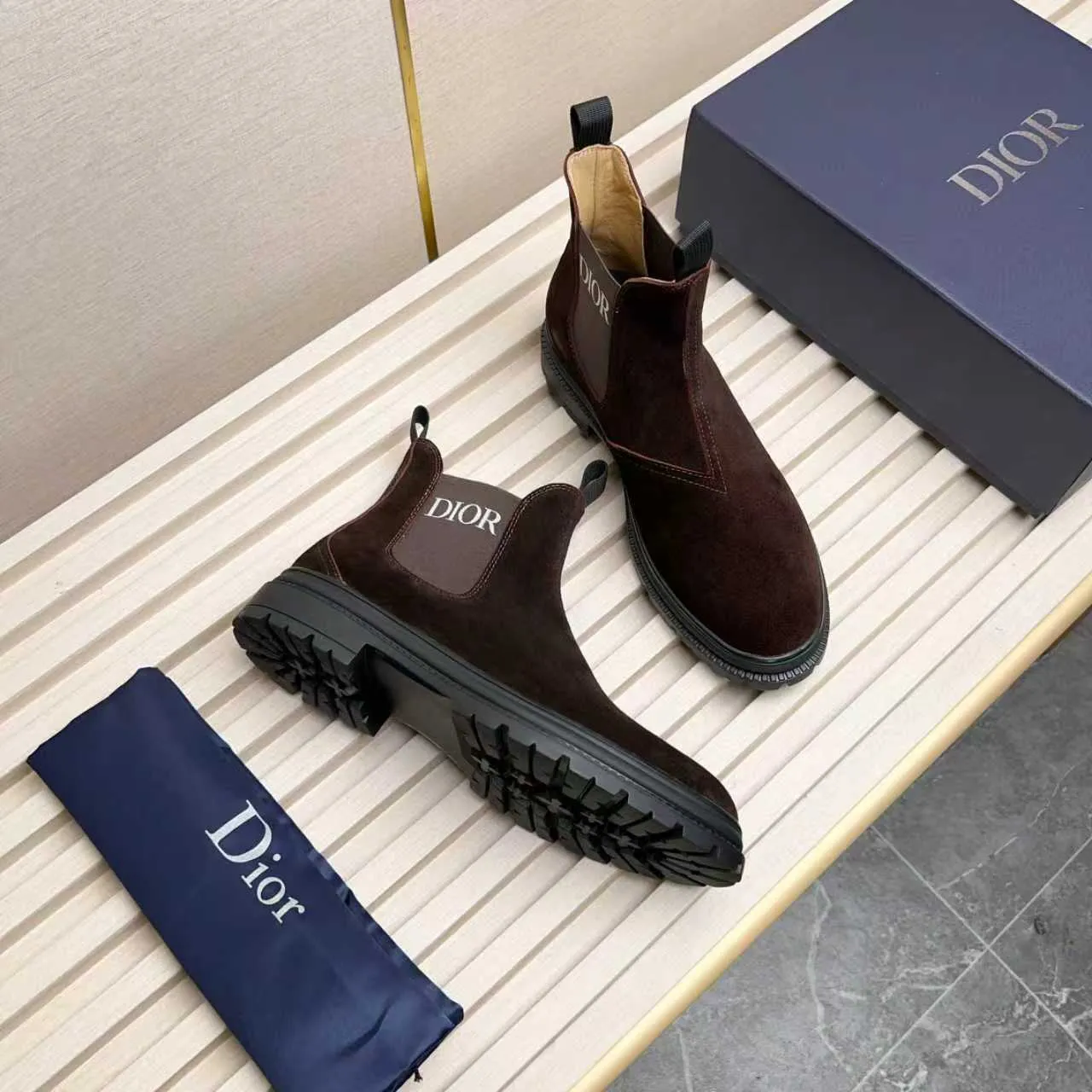 Men's Shoes 💰480 Dior A practical choice that combines protection with classic style. Made from durable Rugged Calf leather, it's tumbled and hand-finished to create a soft suede feel with a rich texture. Elastic side panels and subtle cutouts are inspired by the classic Chelsea boot. Leather upper and lining with Kummel tabs at front and rear, rubber outsole